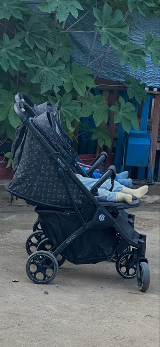 Прогулочная коляска new lux