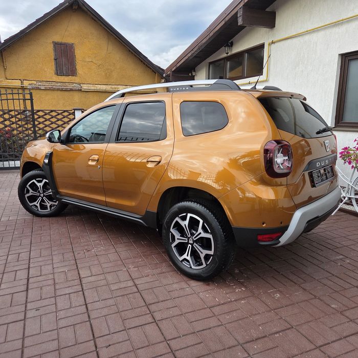 Dacia Duster 4x4 1.2 benzina 125CP Turbo~Impecabil~Prestige Orange~jante/Navi/Camera/carte service