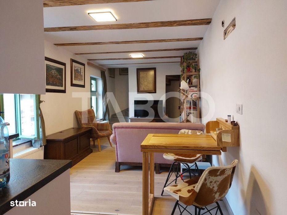 Apartament de vanzare 105 mp 3 camere curte 340 mp in acte Cisnadie