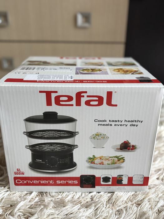 Este nou Aparat de gatit cu aburi Tefal VC1401, 900W, Timer, oprire automata, depozitare compacta, grile detasabile,
