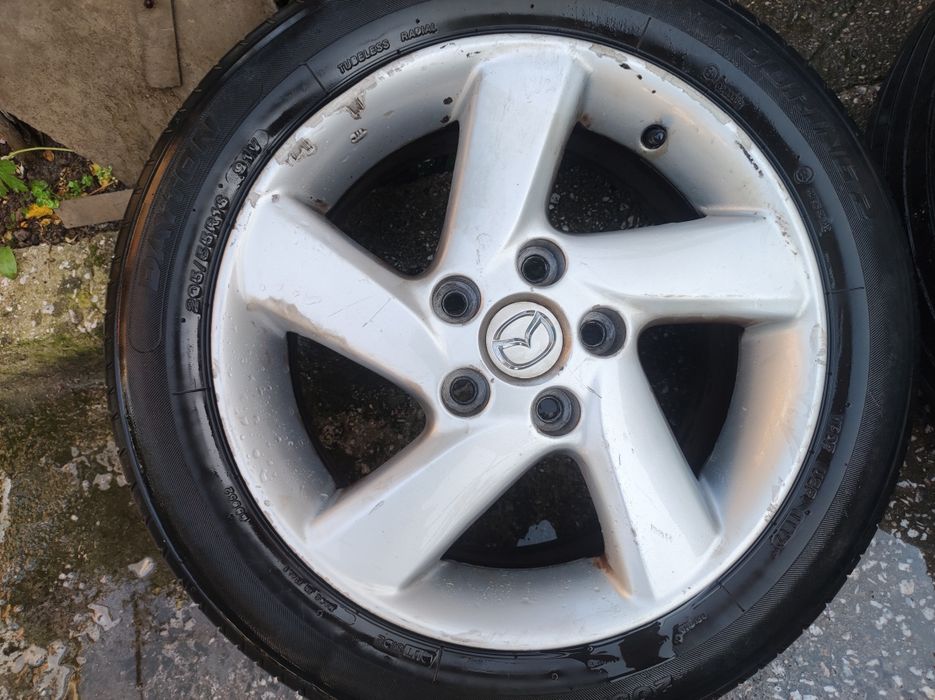 Джанти с гуми за Мазда 6