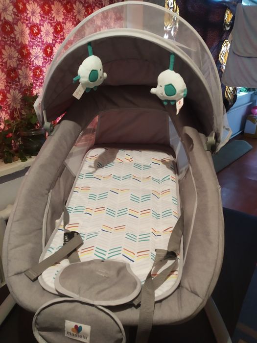 Укачивающий шезлонг