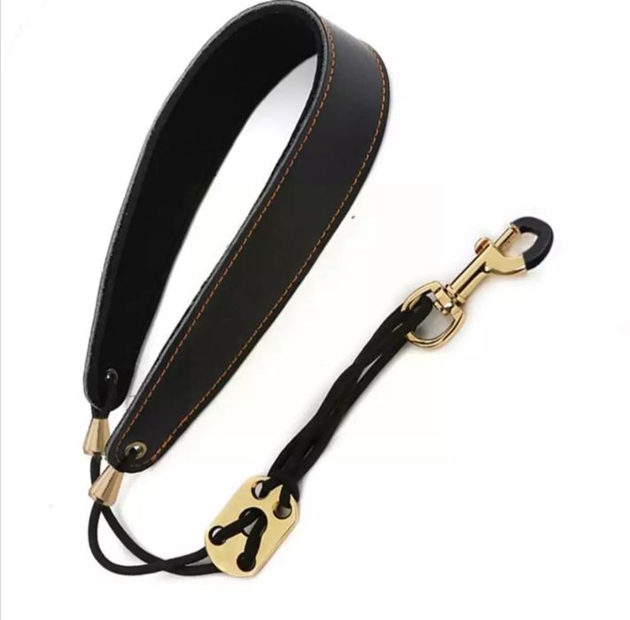 Curea  saxofon gâtar