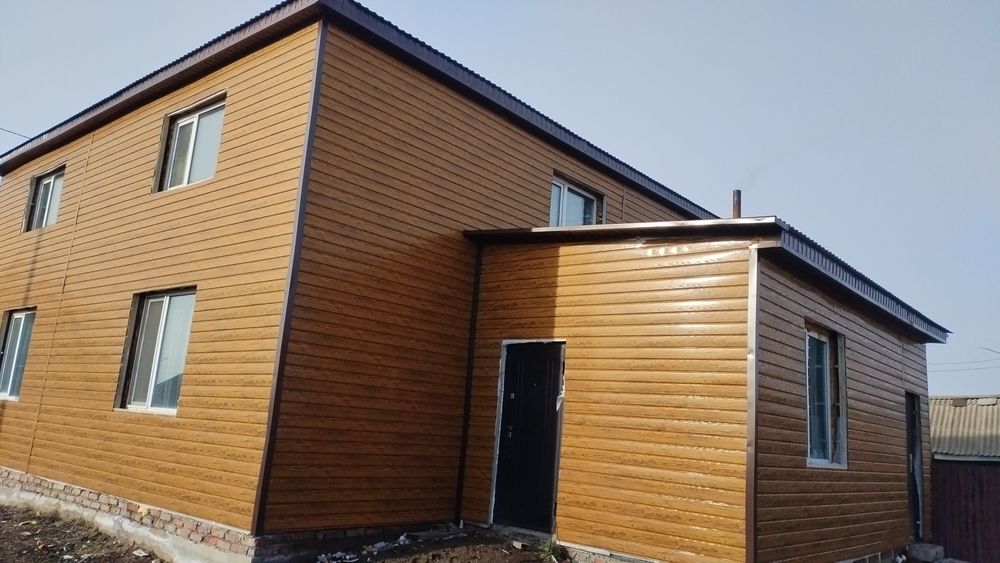 Обшивка фасада сайдингом, профлистом