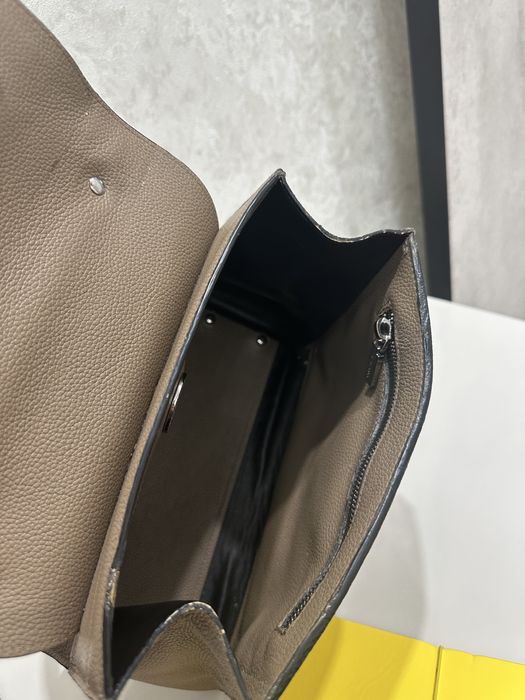 Сумка таза кожа