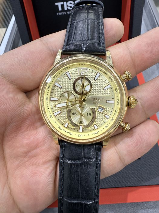 Золотые часы Tissot 750пробы