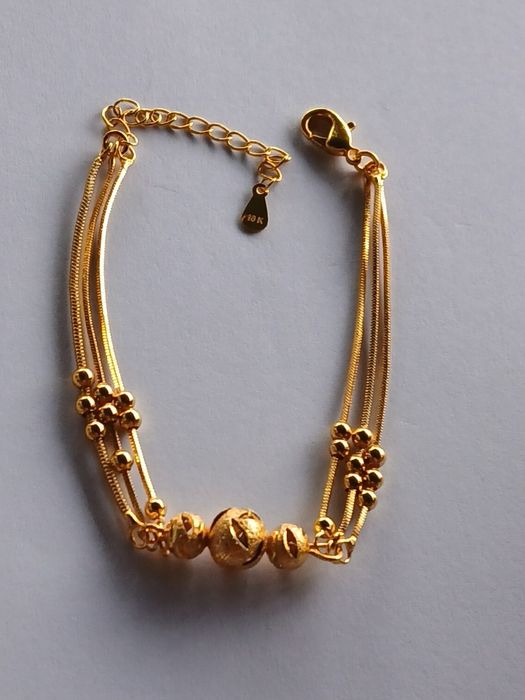 Brățară de dama ,plăcută cu aur 18k