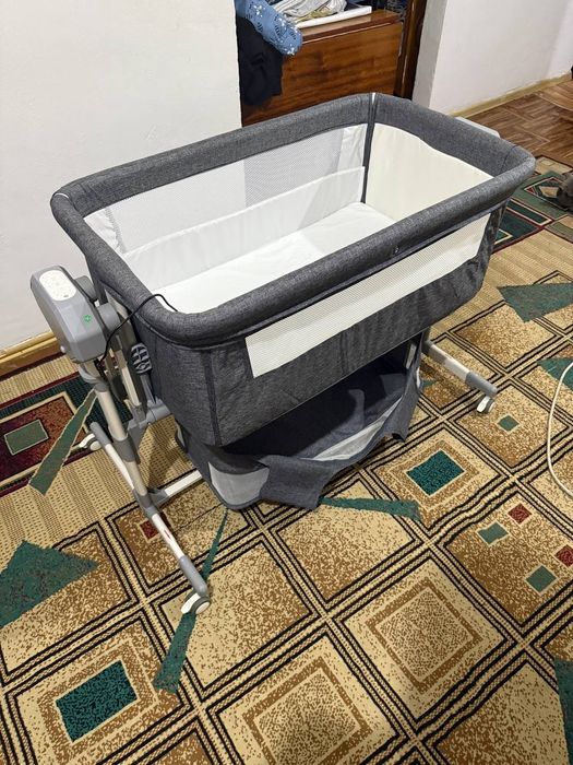 Продаю электрический манеж