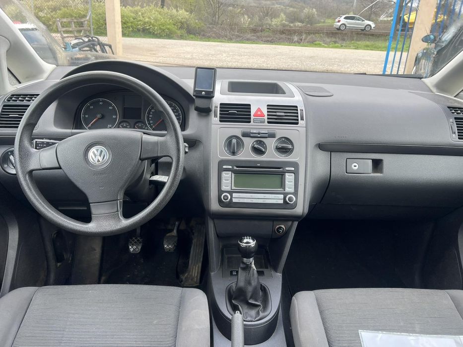 Vw Tuaran 1.9 105кс.код на мотора BLS 2009г.