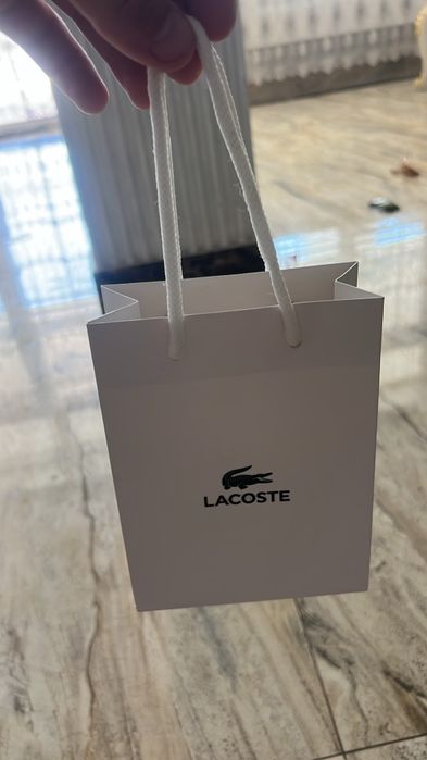 Brățară Lacoste.