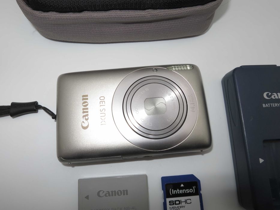 Canon IXUS 130 ултра компактен цифров фотоапарат, дигитална камера в сребърен цвят, 14MP, отлично състояние, пълен комплект, работи перфектно!