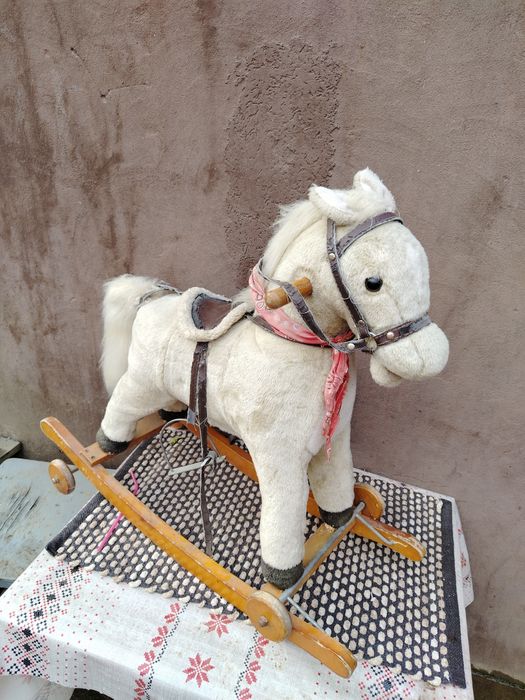 Căluț balansoar cu roti