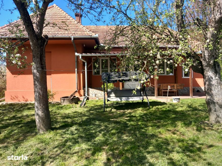 Teren spectaculos ,Porumbeni12.822 mp  livadă,case și panoramă superba