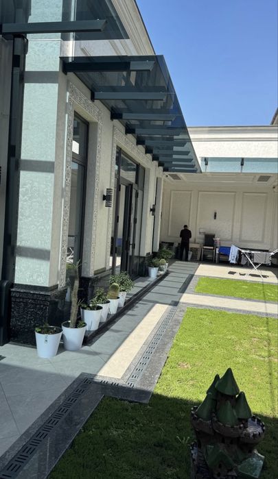 Стеклянные навесы и козерки