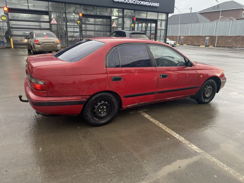 Тойота Carina e