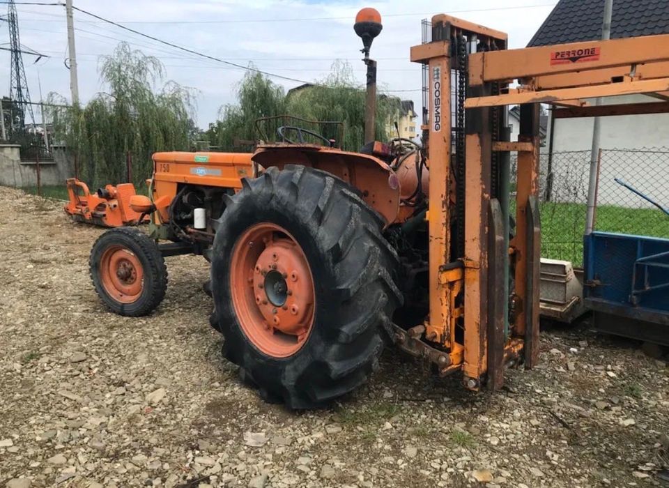 Încărcător în tiranti