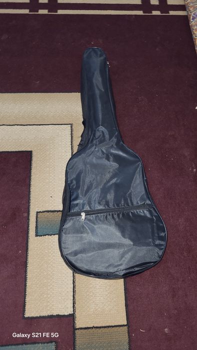 Жана  гитара сатады