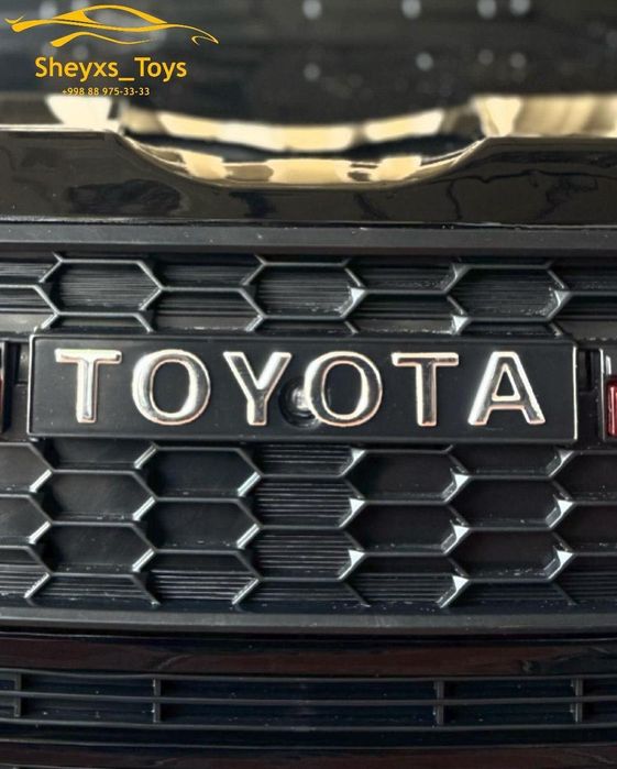 Toyota Land Cruiser 300 икки у́риндикли болалар машинаси