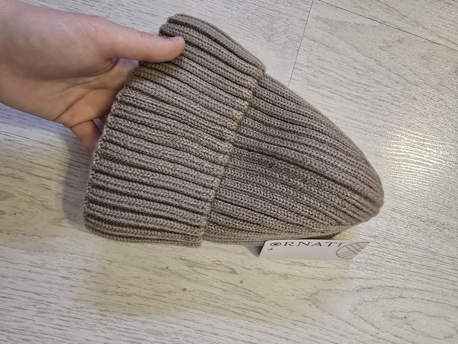 Продам шапку бежевого цвета