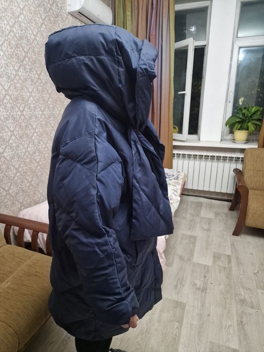 Продам пуховик тёмно-синего цвета