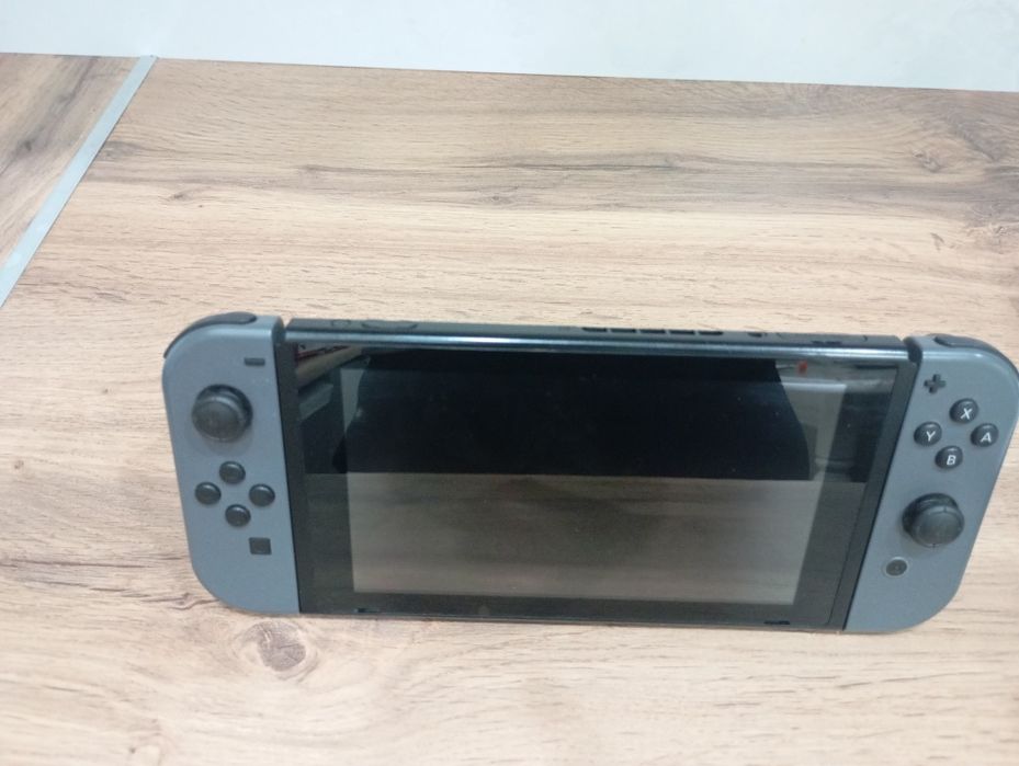 Nintendo Switch серый в отличном состоянии