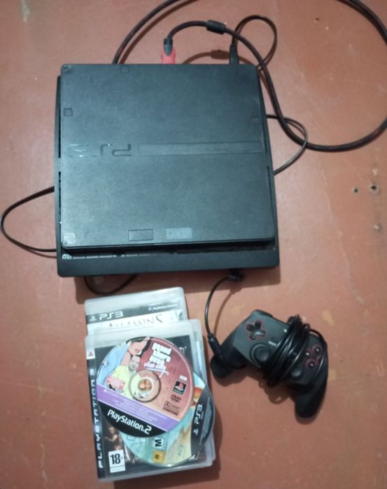 Продам прошитую приставку с дисками ps3