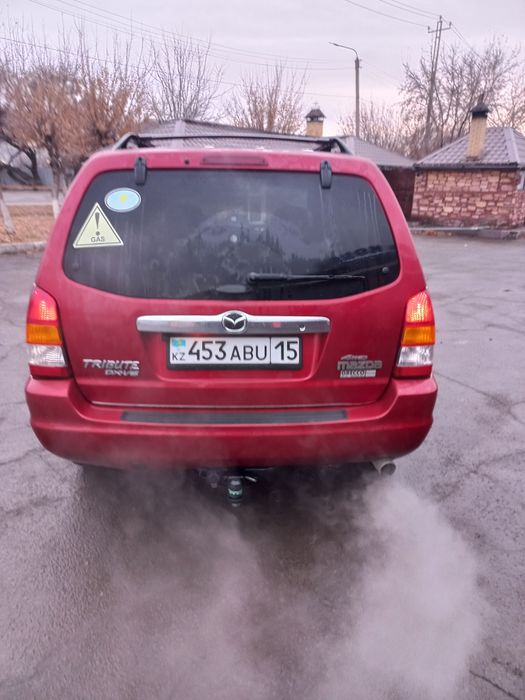 Проас Mazda tribute