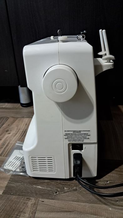 Mașină de cusut Veritas