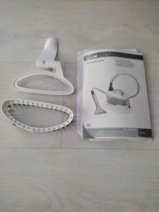 Mașină de călcat cu abur