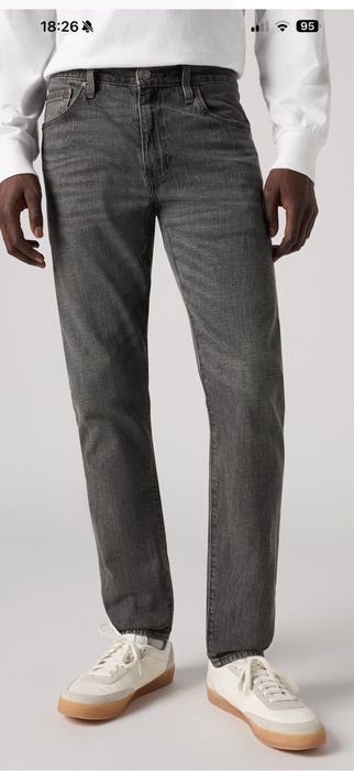 Blugi Levi’s, conici,