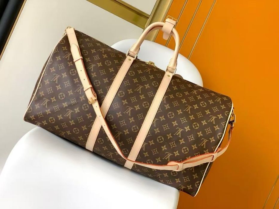 Сумка Keepall 45 cm с плечевым ремнем Louis Vuitton