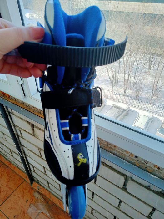 Роликовые коньки