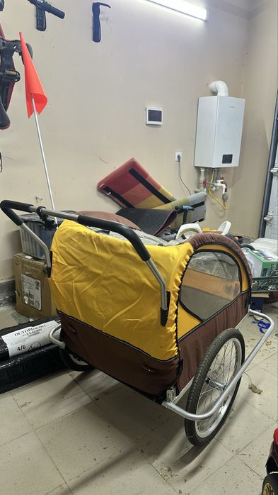 Коляска-велоприцеп