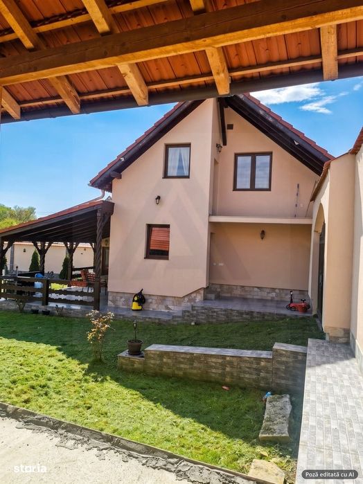 Casa individuala cu garaj 60 mp si teren+gradina 2650 mp in Porumbacu