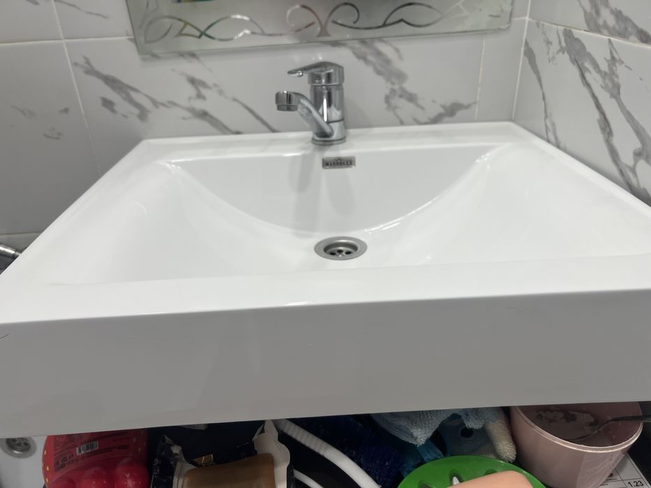 Раковина Қолжуғыш