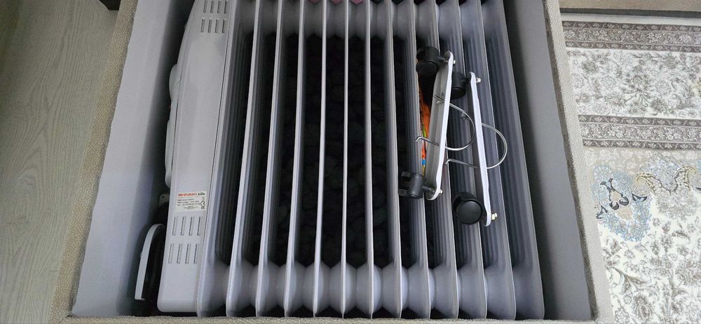 Продам масляный обогреватель Shivaki 12 секций, практический новый