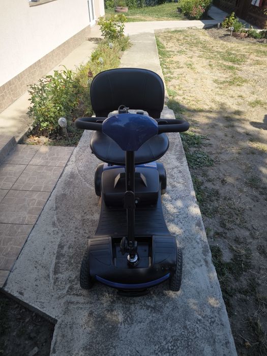 Cărucior electric pentru persoane cu dizabilități