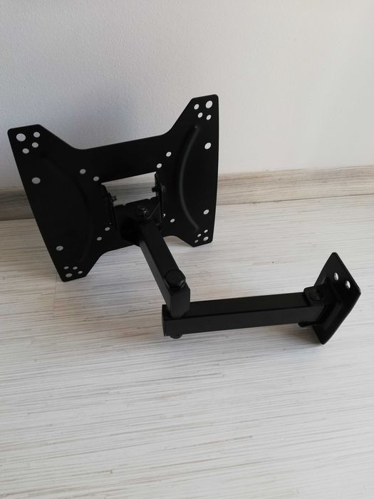 Tv поставка за стена