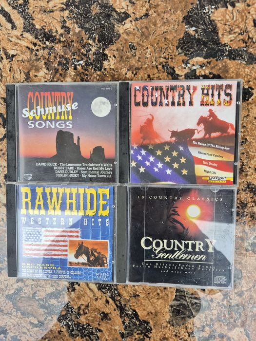 Vând 17CD muzica Country, salsa,grecesca,mixta  artisti internationali
