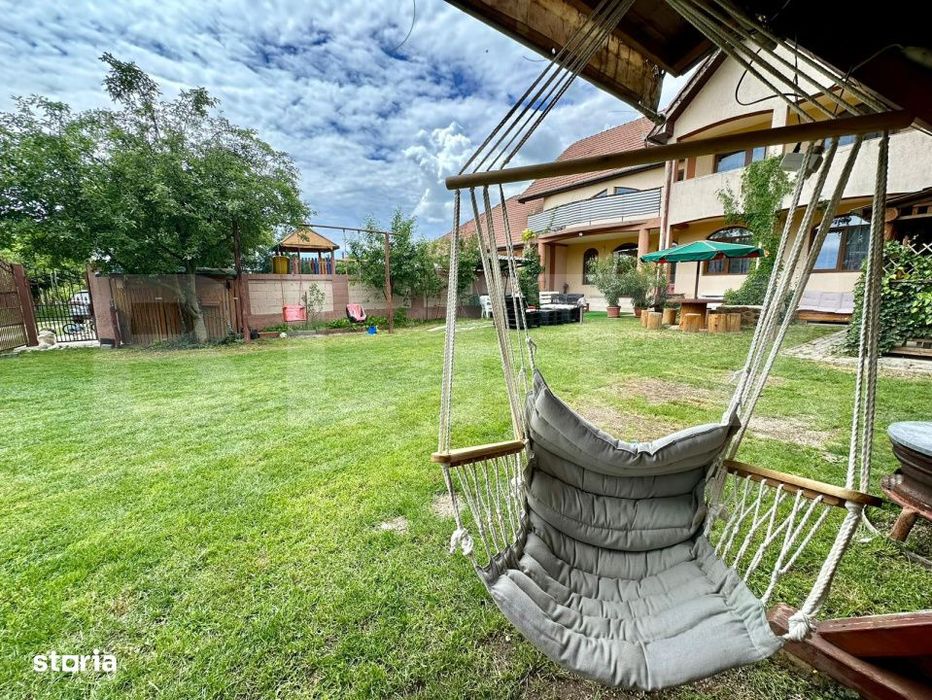 Casa 5 camere,teren 700 mp, foisor si gratar,Micesti