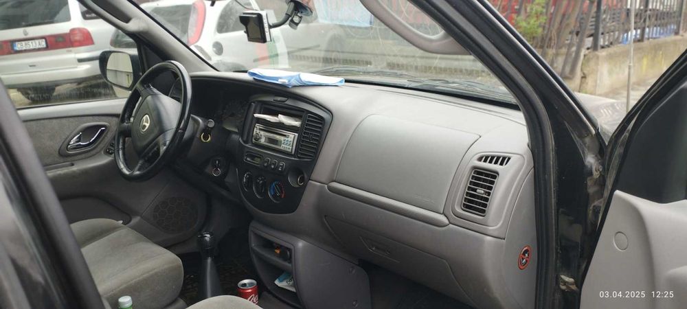 Мазда Трибют 2.0