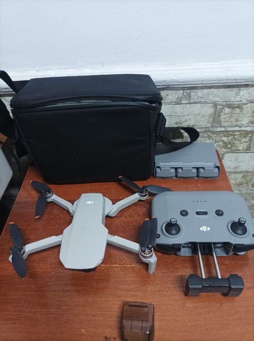 Дрон DJI Mini 2 SE Fly More Combo серый