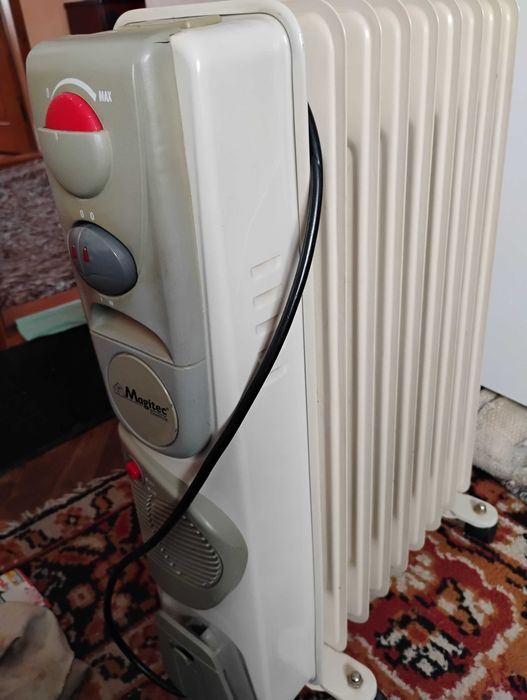 Vând calorifer electric