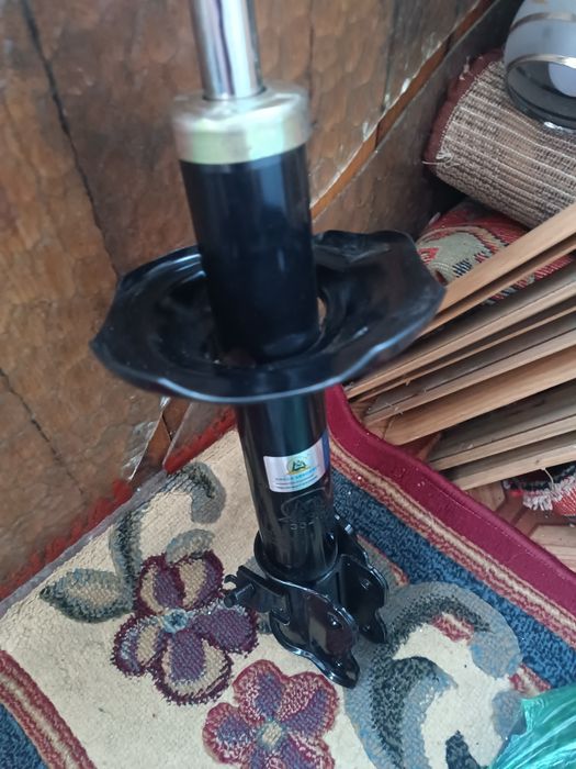 Амортизатор Ниссан