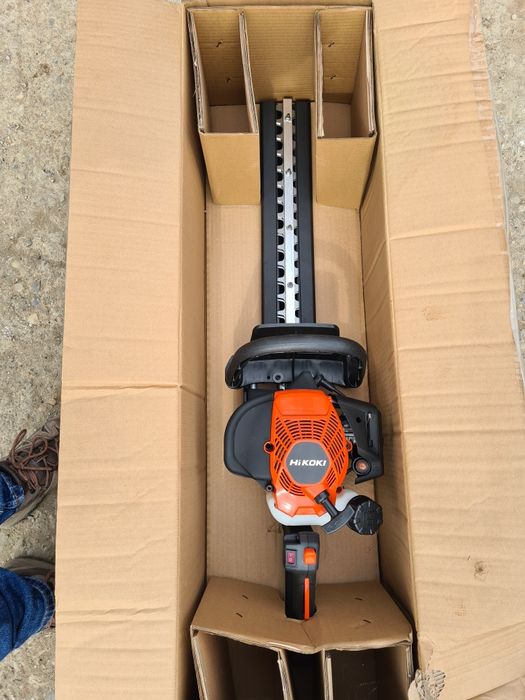 Trimer gard viu utilizat sau nou