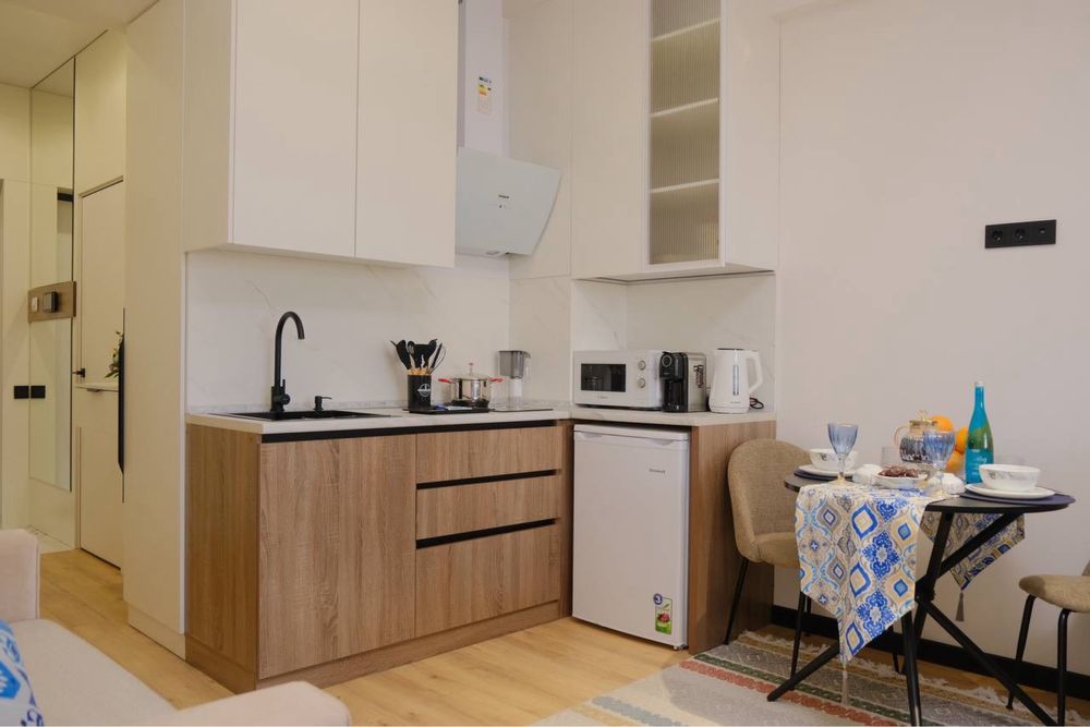 Современная посуточная уютная студия со своей парковкой в NRG U Tower