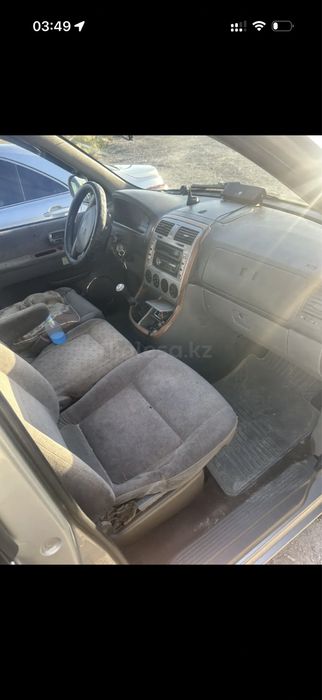 Kia Carnival 2002 год