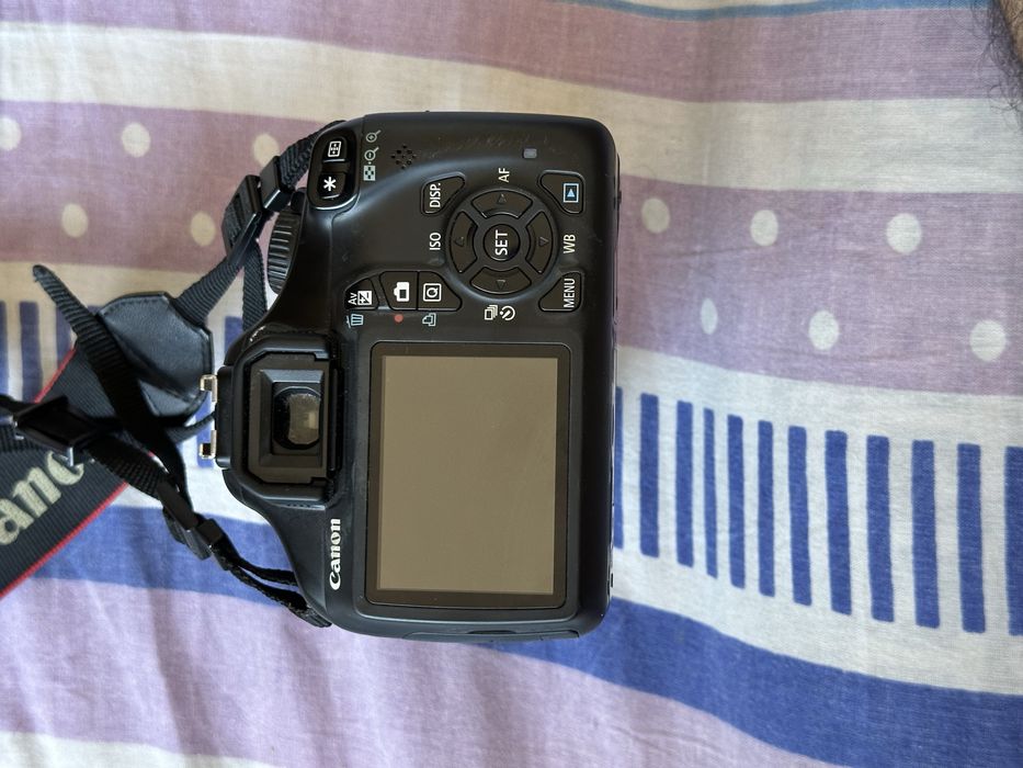 Canon EOS 1100D / DS126291 — идеальное состояние