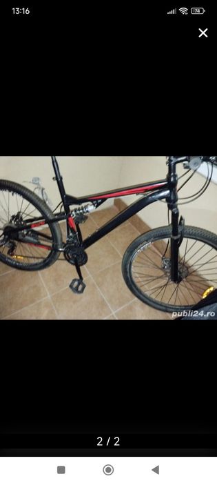 Bicicleta aproape noua
