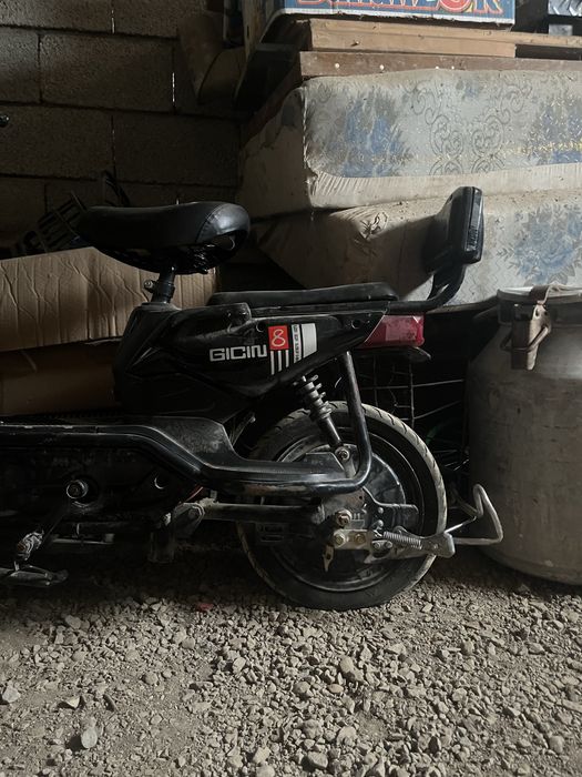 Электроный скутер